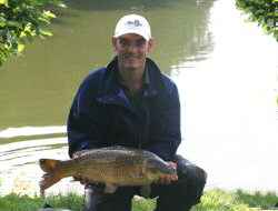 Glen Burden lands a carp Glen Burden lands a carp