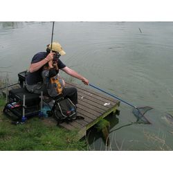 It is safely in the net and Che lands his first Carp!